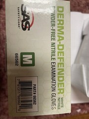 Medium powder free nitrile gloves 100 Pair Per Box By Weight.