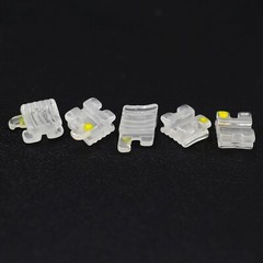 Dental Orthodontic Ceramic Brackets Self Ligating Braces Clear Sapphire Roth MBT